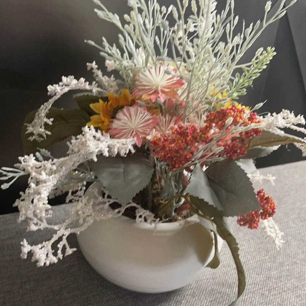 Dried faux‎ flowers in white squat pot decor